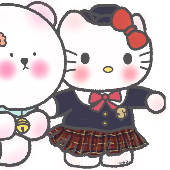 Có hai con búp bê hello kitty đứng cạnh nhau