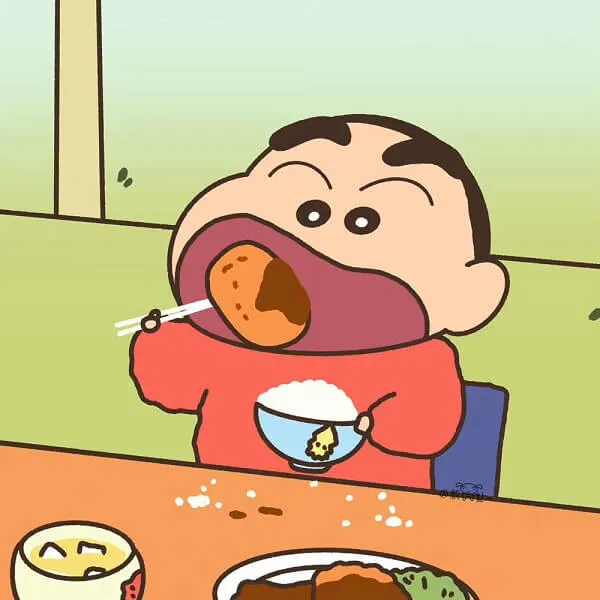 Có một hình ảnh hoạt của cậu bé ăn thức bàn