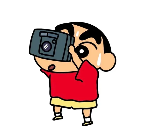 Có một cậu bé hoạt hình chụp ảnh với máy