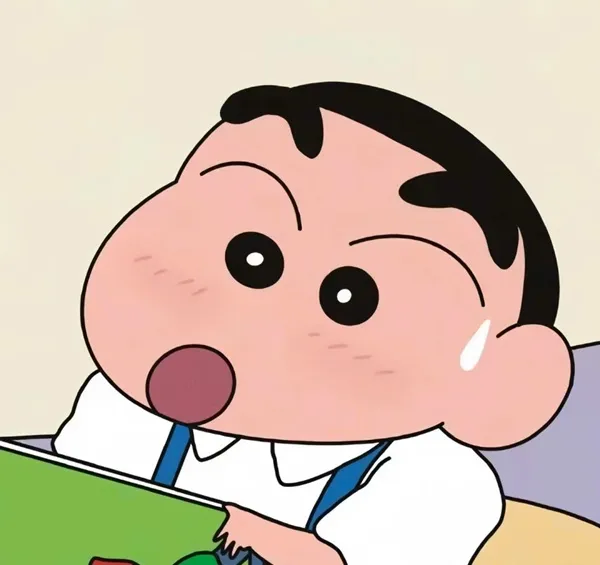 Có một hình ảnh hoạt của cậu bé đang đọc sách