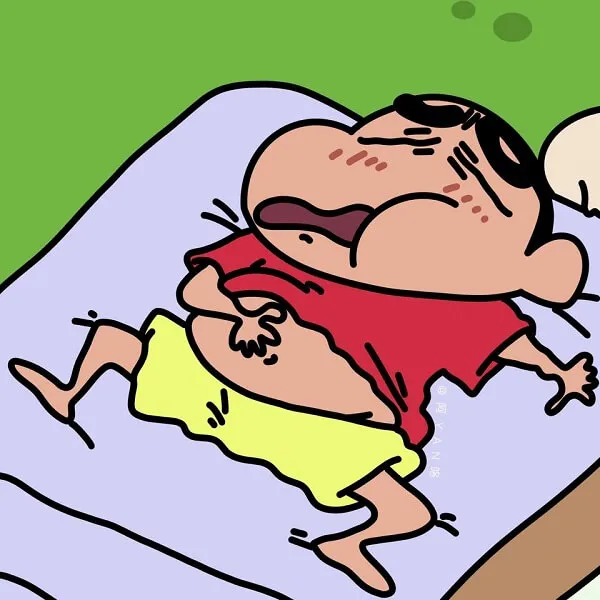 Hình ảnh phim hoạt của một người đàn ông đang ngủ trên giường với cái đầu gối