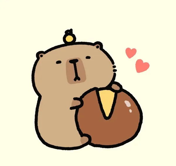 Có một con gấu teddy đang cầm chiếc bánh mì tròn với trái tim trên đó