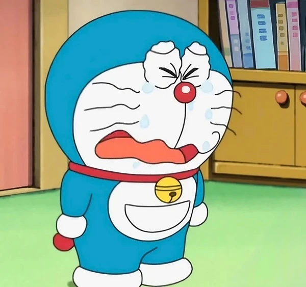 Một nhân vật hoạt hình trong bộ trang phục màu xanh crying meme