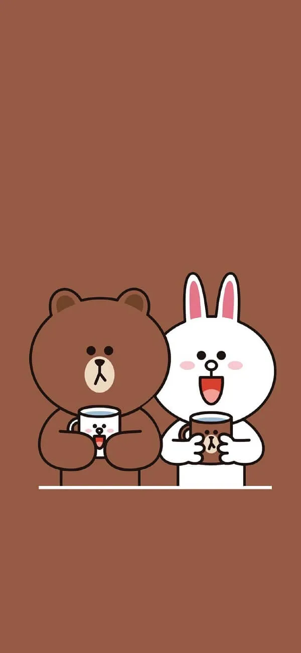 Một con gấu nâu và một con gấu hình nền màu nâu nhạt cute trắng đang ngồi ở bàn