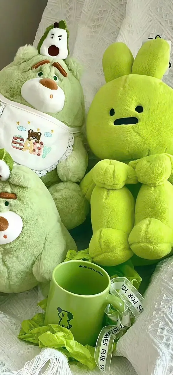 Hình nền màu xanh lá cây một con gấu bông màu xanh lá cây