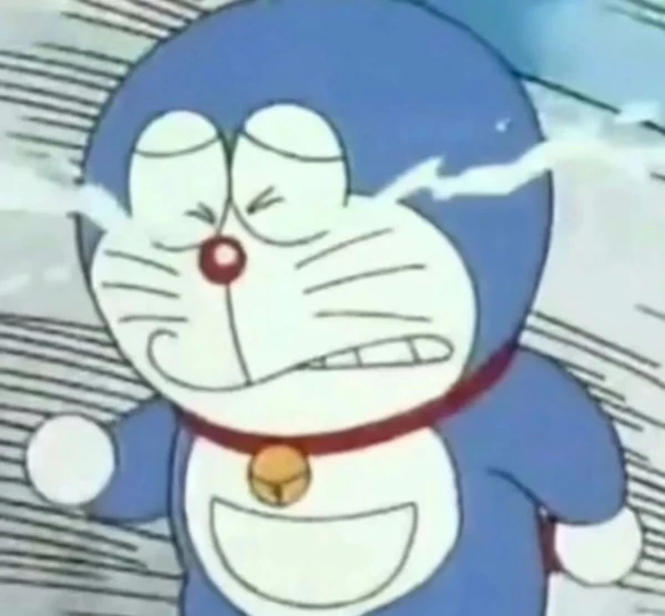 một nhân vật hoạt hình với cổ áo đỏ và áo sơ mi màu xanh meme doraemon