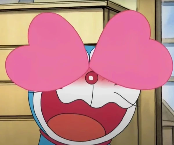 một nhân vật hoạt hình với mũi hình trái tim meme doraemon