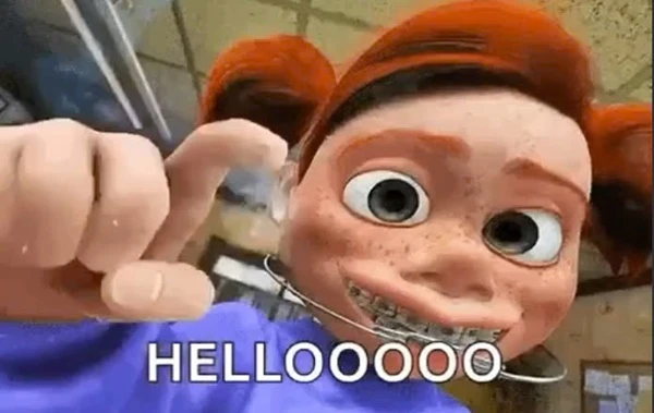 một nhân vật hoạt hình với mái tóc đỏ và áo sơ mi màu xanh meme hello