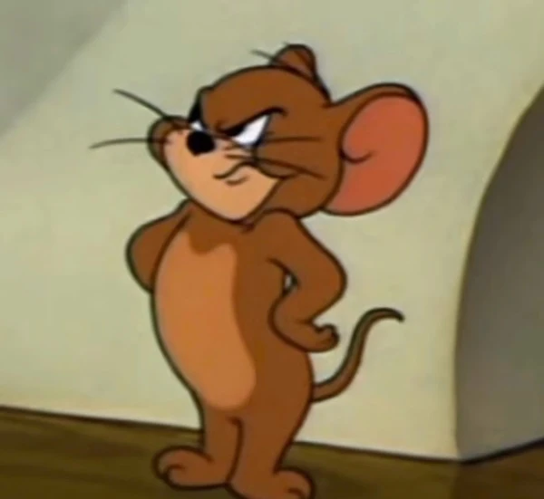 Một con chuột hoạt hình đứng trước tường chủ đề meme tom and jerry