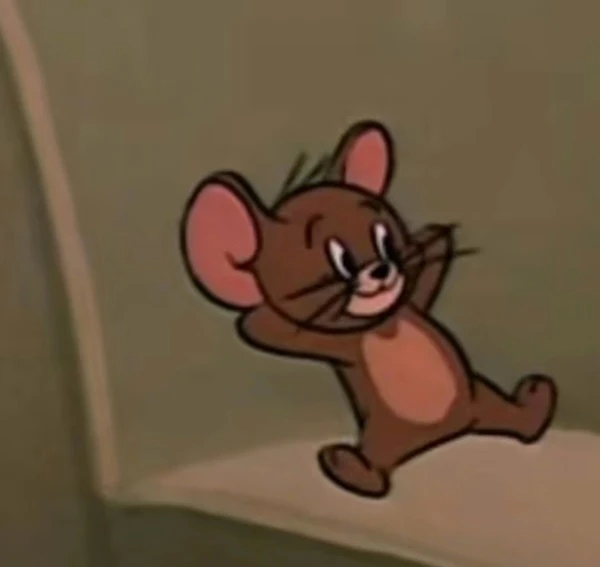 Một nhân vật hoạt hình đang đứng trên ghế (tag: meme tom and jerry)