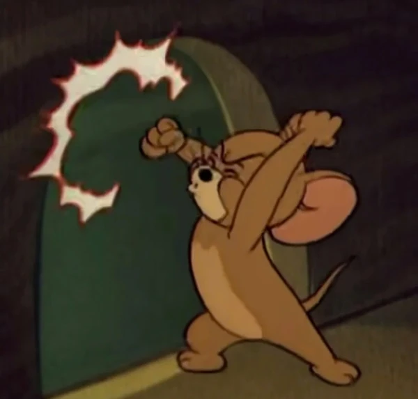 Một nhân vật hoạt hình đang đứng trước màn hình màu xanh lá cây - meme tom and jerry
