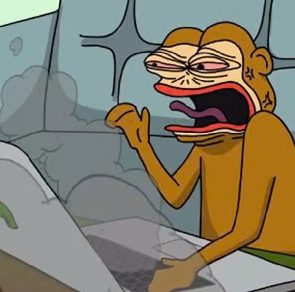 Một con khỉ hoạt hình đang ngồi trên chiếc ghế dài với máy tính xách tay meme tức giận