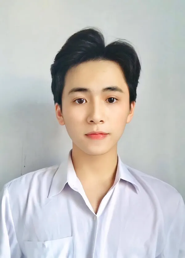 Ảnh trai đẹp học sinh có một chàng trẻ mặc áo sơ mi trắng tạo dáng cho bức tranh