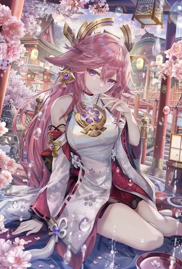 Ảnh yae miko cosplay một cô gái anime với mái tóc dài màu hồng ngồi trên mặt đất trước hoa
