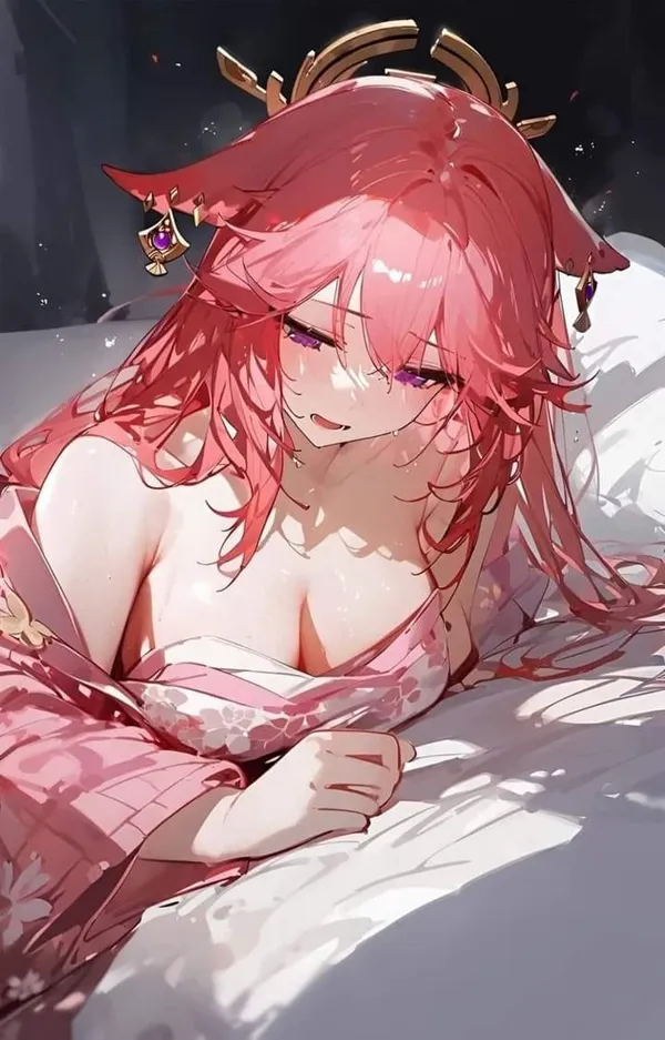 Ảnh yae miko cute có một người phụ nữ mái tóc màu hồng nằm trên giường