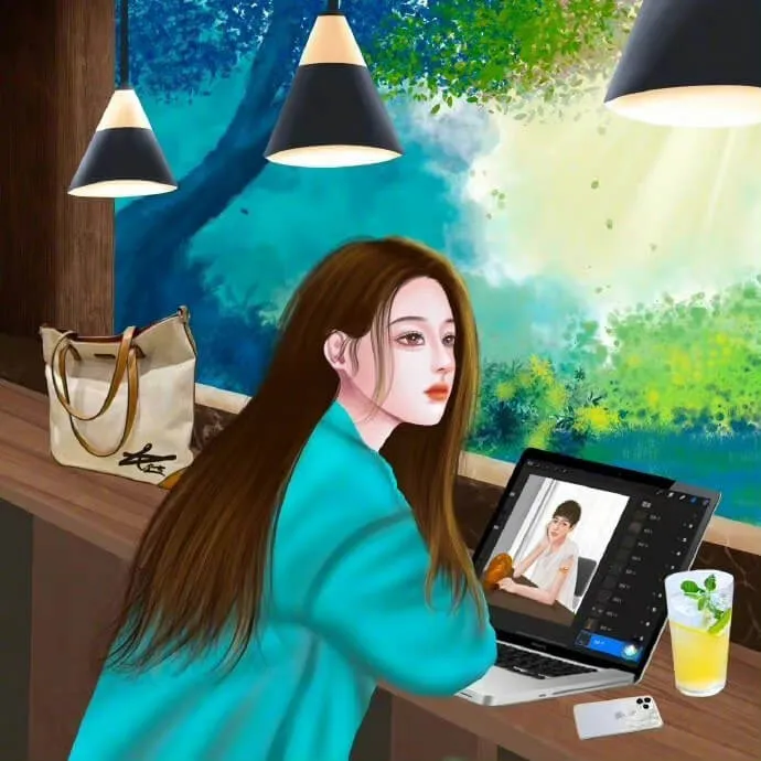 Có một người phụ nữ ngồi bàn với máy tính xách tay
