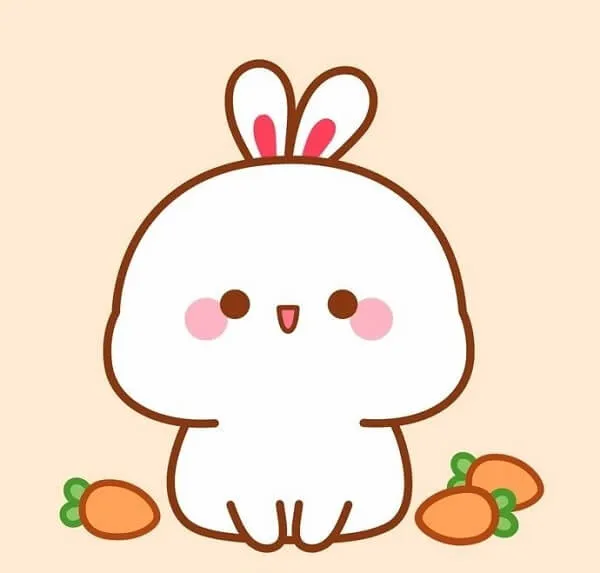 Đây là hình ảnh của một chú thỏ nhỏ dễ thương với cà rốt
