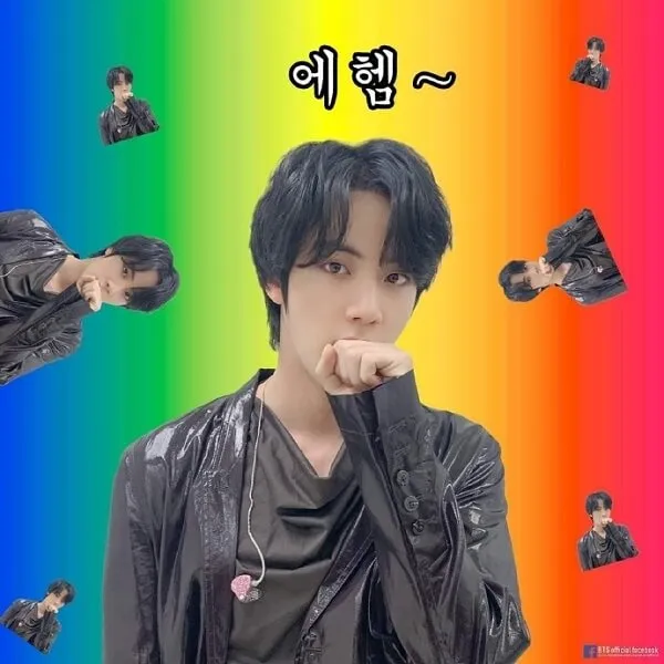 Jin ảnh bts khóc có một người đàn ông đang đứng trước nền cầu vồng