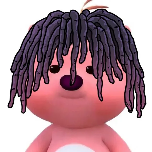 Có một con gấu bông màu hồng với dreadlocks trên đầu