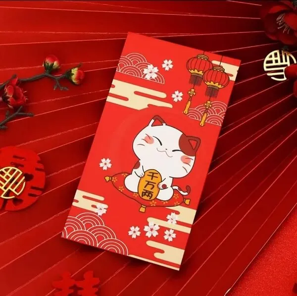 Lì xì đây là hình ảnh của một phong bì màu đỏ với con mèo trên đó